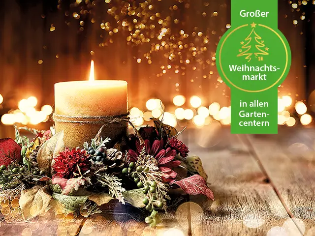 kreatives Adventsgesteck mit stimmungsvollem Lichterhintergrund